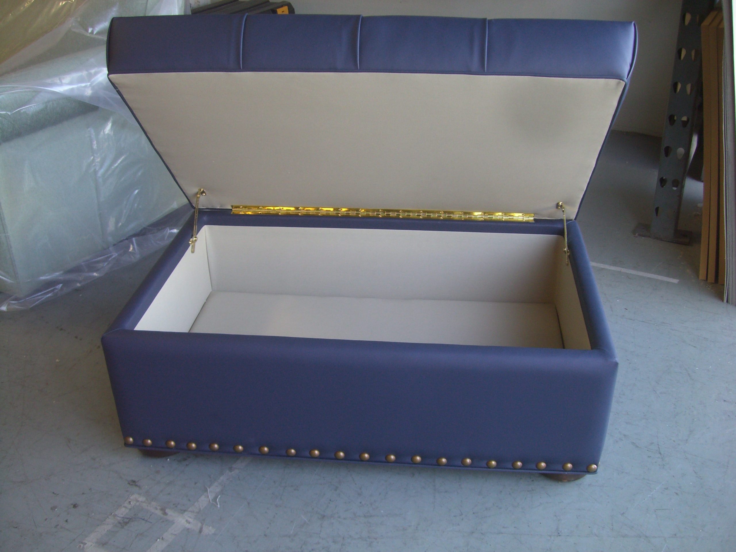 Custom Reupholstered Opening Ottomans